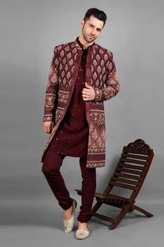 Wine, maroon sherwani with paisley, floral embroidery. Paired with kurta and churidar.
Component: 3
Pattern: Embroidery
Type Of Work: Paisley, floral
Neckline: Mandarin collar
Sleeve Type: Full sleeves
Fabric: Velvet
Color: Maroon,Wine
Other Details: 
Front button detailing
Occasion: Destination Wedding - Aza Fashions Wedding Blazers For Men, Maroon Sherwani, Indowestern Outfits For Men, Embroidery Paisley, Embroidered Sherwani, Groom Dress Men, Velvet Embroidery, Sherwani Groom, Marriage Dress