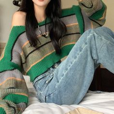 Green Striped Crop Sweater This Green Striped Crop Sweater exudes elegance with its classic stripes and chic cropped design. Made with soft and comfortable fabric, it is perfect for any occasion. Stay stylish and warm with this sophisticated sweater. Crop Pullover, Korean Streetwear, Cropped Pullover, Kawaii Dress, Classic Sweater, Long Sleeve Knit Sweaters, Crop Sweater, Y2k Streetwear, Green Sweater