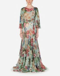 This luxury Chiffon Floral-Silk Flutter-Sleeve Gown by Dolce & Gabbana is hand-painted with a delicate floral print. Crafted from lightweight chiffon, dress epitomizes the elegance, glamour, and passion of Mediterranean. Make an unforgettable entrance at your next special event refined sensual look. Elegant Multicolor Silk Chiffon Dress, Elegant Multicolor Silk Gown, Elegant Evening Dresses Long, Floral Print Chiffon Dress, Elegant Evening Dresses, Green Outfits, Floral Print Dress Long, Women Fashion Casual, 40 Women