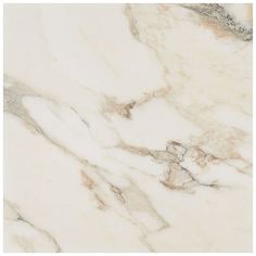 a white marble textured surface with brown accents