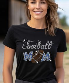 Football Mom, Orange, Lite Blue, Green, Red, Rhinestone T-shirt.       Rhinestone area 7.75(h) x 9.75 (w) *-Bella Canvas T-shirt brand. Shirts are 100% cotton, stretchable Graphic Tee With Rhinestones And Crew Neck, Rhinestone Graphic Tee, Football Mom Tank Tops, Rhinestone Cheer Mom Shirts, Casual Crew Neck T-shirt With Rhinestones, Graphic Tee T-shirt With Rhinestones, Short Sleeve, Black Crew Neck T-shirt With Rhinestones, Cotton T-shirt With Rhinestones And Short Sleeves, Cotton Short Sleeve T-shirt With Rhinestones