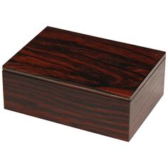 a wooden box sitting on top of a white surface