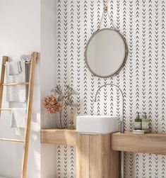 a bathroom with a sink, mirror and ladder