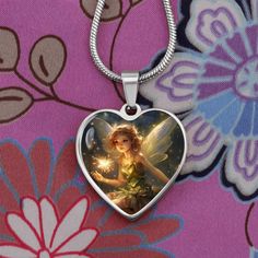 Discover the magic and strength of the Ellyllon Wales Fairy with our Fairy Heart Pendant, a masterpiece designed to exceed your highest expectations and bring enchantment into the life of someone special. This astonishing necklace, featuring a meticulously engraved design of the Ellyllon Wales Fairy on the heart pendant, is not just a piece of jewelry; it's a token of love, strength, and protection. Crafted from high-quality surgical steel with a liquid glass coating for a shatterproof finish and an optional 18k gold finish, this pendant is a testament to enduring love and the mystical power of nature's guardians. Made in the U.S by talented working moms, this piece celebrates strong communities and the spirit of craftsmanship. Embrace the Ellyllon Wales Fairy's blessings of strength and p Fairy Heart, Fairy Jewelry, High Expectations, Engraved Design, Luxury Necklace, Glass Coating, Silver Engraving, Working Moms, Love Symbols