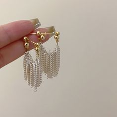 Color: Multi-Layer Chain Tassel Earrings Fashion Element: Chain Style: Classic style Silver Dangle Tassel Earrings, Trendy Silver Dangle Tassel Earrings, Silver Dangle Tassel Earrings With Fringe, Trendy Silver Tassel Drop Earrings, Metal Tassel Dangle Earrings With Fringe, Layer Chain, Waterfall Design, Layered Chains, Style Classic