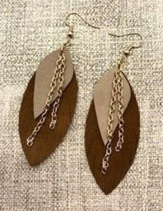 Faux leather embellished with chain detail.  This earring can be custom colored. Leather Feather Earrings, Cork Earrings, Chain Earring, Faux Leather Earrings, Feather Earrings, Chain Earrings, Leather Earrings, Favorite Jewelry, Custom Color