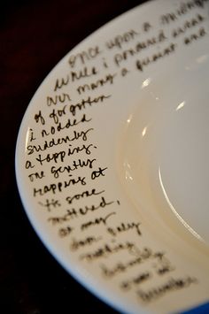 a close up of a plate with writing on it