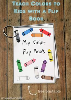 a book with the title teach colors to kids with a flip book