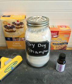 a glass jar with dry dog shampoo next to other items