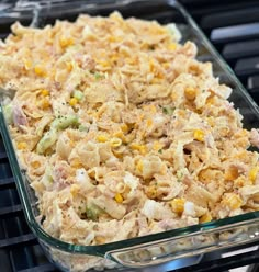 a casserole dish is sitting on the grill