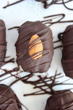 chocolate covered donuts with wood in the middle