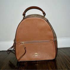 New Condition. Brown And Tan. No Tags Or Bag. I Have Detailed Pictures Of The Entire Bag Including The Bottom And Inside The Pockets Shown. Coach Backpack Jordyn, Coach Jordyn Backpack, Signature Canvas, Detailed Pictures, Coach Bags, 4 H, Bag Lady, Conditioner, Size 10