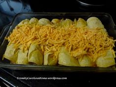 some food that is sitting in a pan on the stove top and ready to be cooked