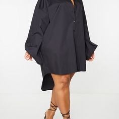 Make A Serious Style Statement In This Shirt Dress. Featuring A Black Material With A Balloon Sleeve Design And Button-Up Detail. Wear This With Heels And Hoop Earrings For A Simple But Chic Combo. Fabric And Care 55% Cotton 45% Polyester Never Warn/ New With Tags Smoke And Pet Free Home Oversized Black Dresses With Buttons, Oversized Black Dress With Buttons, Oversized Long Sleeve Shirt Dress For Brunch, Oversized Collared Dresses In Solid Colors, Oversized Chic Shirt Dress For Brunch, Chic Oversized Collared Dresses, Elegant Oversized Mini Dress, Oversized Black Collared Dress, Oversized Long Sleeve Mini Dress For Daywear