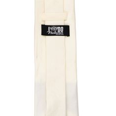 This ivory silk necktie is elegant and romantic. It's not only soft on the eyes, but also soft to the touch. Made from 100% silk and cut to a contemporary, 3.25-inch width. Perfect for weddings and your most formal occasions. Product Features I Do Neckwear® 3.25" width, at the widest point 57" length, tip to tip Color is ivory Made from 100% Silk Light satin finish Dry clean only Imported Classic White Tie For Wedding, Classic White Wedding Tie, White Standard Tie For Black Tie Events, White Standard Tie For Gift, White Necktie For Gift, Classic White Formal Tie, Elegant White Tie For Groom, Elegant Beige Tie For Black Tie Events, White Standard Tie As Gift