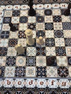 a chess board with several pieces on it