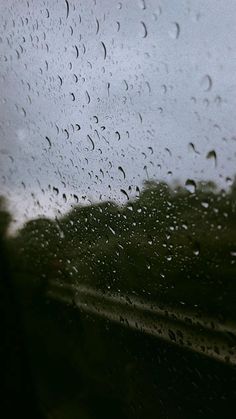 rain drops on the windshield of a car