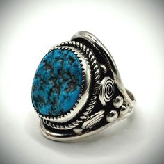 Mens turquoise rings in sterling silver.  This gorgeous Navajo sterling silver oval dome ring features a beautiful turquoise gemstone and stunning detailed silver design.  This unique ring works well as a mens turquoise wedding band.  It is a substantial native American handmade ring and its large turquoise gemstone makes it an unforgettable statement piece.  This large mens ring measures almost 1.5 inches and is a size 10, making it perfect for a large man's hand.  It is stamped sterling and wi Mens Turquoise Rings, Turquoise Wedding Band, Large Turquoise Ring, Turquoise Wedding, Dome Ring, Silver Design, Gift For Husband, Mens Ring, Gift For Boyfriend