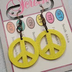 "Yellow wooden peace sign dangle earrings.  Dangle approx 2\".  Hypo-allergenic copper ear wires." Wooden Peace Sign, Etsy Earrings Dangle, Earrings Dangle, Peace Sign, Lebanon, Wooden Beads, Ear Wires, Jewelry Earrings Dangle, Dangle Drop Earrings