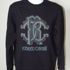 European Designer - Please Check Measurements Below Before Buy!!! Brand New With Tags Attached Roberto Cavalli Italy 100% Authentic Guaranteed Nwt $400 Studded Sweatshirt Top Medium Crewneck Long Sleeve Color Black Embellished With Gun Metal Studs Logo Graphic Knitted Neck, Cuffs & Hem 100% Cotton Regular Fit Authenticity Hologram Located On Inner Tag Measurements: Size Armpit To Armpit Length Shoulder From Seam To Seam M 22 In 27½ In 18½ In Luxury Black Cotton Sweatshirt, Designer Black Long Sleeve Sweatshirt, Studded Sweatshirt, Men Crewneck, Black Hoodie Men, Logo Sweatshirt, Cotton Pullover, Hooded Pullover, Roberto Cavalli