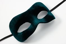 Green masquerade mask decorated with green velvet fabric and satin ribbons. Masquerade masks made by Maskaku are a product of love for beauty and handicrafts.  All products are unique and entirely hand-made. Masks can cover your face but you are still guaranteed to stand out wearing one of them. They are ideally suited for a masked ball, costume party or a wedding gift. Many designs come in pairs both for him and for her in similar colors but unique shapes.  I'm sure you will find the one that s Green Masks For Carnival Costume Party, Green Masquerade Mask For Mardi Gras Party, Green Masquerade Mask For Mardi Gras, Green Mask For Masquerade Carnival, Green Masks For Masquerade Carnival, Green Masks For Carnival Masquerade, Green Eye Mask For Masquerade, Green Masquerade Mask, Green Velvet Fabric