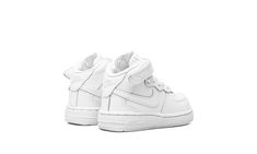 The Nike Force 1 Mid TD “White on White” is the toddler sizing of the monochromatic white colorway of the classic vintage basketball shoe.  Worn by the NBA’s most popular basketball players in the 1980s before becoming a modern lifestyle shoe, the Air Force 1 is one of Nike’s most renowned sneakers.  The mid-top “White on White” features an all-white leather upper with tonal overlays and Swoosh branding.  A white Swoosh is embroidered on the lateral side of the adjustable strap.  Tonal “Nike Air Nike Air Force 1 Mid Off White, Nike White Mid-top Sneakers, White Mid-top Nike Air Force 1, Nike Air Force 1 Mid-top Synthetic For Streetwear, White Synthetic Nike Air Force 1 Mid-top, Nike Force 1, Air Force 1 Mid, Mid Top, Nike Kids