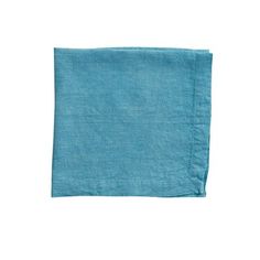 a blue linen napkin on a white background