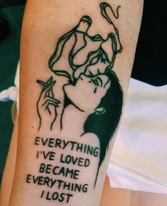 a woman's arm with a tattoo saying everything i've loved is me