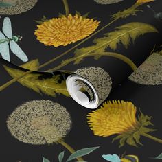 a black wallpaper with yellow flowers and dragonflys on the back dropper