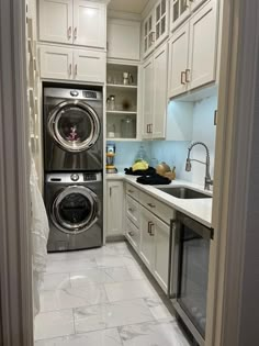 a washer and dryer in a small kitchen