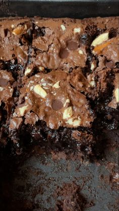 a close up of a chocolate brownie in a pan