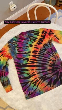 an easy - to - sew tie - dye t - shirt is shown on the table