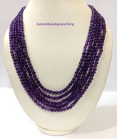 Natural Amethyst Necklace, Amethyst Gemstone 5mm Plain Round Beads Necklace, Handmade Amethyst 5 Strand Beaded Jewelry Necklace Gemstone :- Amethyst Size :- 5MM Approx. Color :- Same as Picture Strand :- 5 Strand Shape :- Smooth Round Quality :- AAA GRADE https://www.etsy.com/in-en/shop/LatestBeadsJewellery?ref=simple-shop-header-name&listing_id=720939504 Your Feedback is very Important for us. If you have any problem regarding packaging or product, kindly contact us to resolve the issue bef Purple Amethyst Necklace With 8mm Beads, Faceted Amethyst Beads, Faceted Round Amethyst Beads, Round Faceted Amethyst Beads, Purple Amethyst Gemstone Beads, Amethyst Gemstone Beaded Necklaces With Round Beads, Polished Amethyst Beaded Necklace, Round Amethyst Beaded Necklace With Polished Beads, Amethyst Gemstone Beaded Necklace