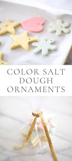 some cookies are sitting on a table with the words, color salt dough ornaments