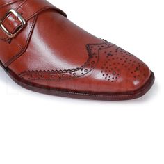 The best thing about leather shoes is that they never go out of fashion. A good quality leather shoe will last you a lifetime and fortunately for men, if you desire something from the formal range, there is a wide variety for them to choose from according to their own styling preferences. These handmade brogue shoes use premium leather in their making and are the ideal choice to sport a smart and sexy look at any formal event, either at work or at a wedding. This special rendition of dark brown wingtip leather shoes flaunts a contemporary look with a single monk strap that makes this footwear every fashion-conscious individual’s wardrobe staple. With a high-end sheen finish, these shoes further accentuate your sense of style with laser cut perforated design on the tip making them different Masculine Brogue Leather Shoes With Almond Toe, Masculine Leather Shoes With Brogue Detailing And Almond Toe, Semi-formal Goodyear Welted Monk Strap Shoes, Brown Wingtip Monk Strap Shoes With Leather Lining, Brown Monk Strap Wingtip Shoes With Leather Lining, Semi-formal Wingtip Monk Strap Shoes With Rubber Sole, Masculine Semi-formal Monk Strap Wingtip Shoes, Masculine Wingtip Dress Shoes With Leather Lining, Semi-formal Monk Strap Shoes With Moc Toe