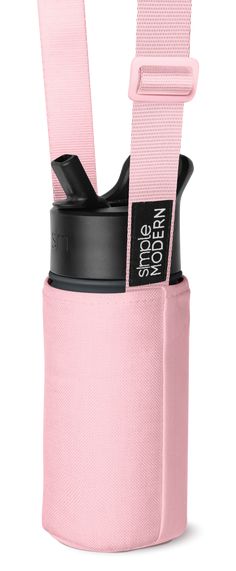 a pink cup holder with two cups in it and the strap hanging down to one side