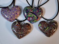 Add a touch of color to your jewelry collection with this beautiful multicolor heart polymer pendants with black wax cord or custom length chain. The heart-shaped pendants are handcrafted with love and features a unique color combinations that will complement any outfit. This pendant necklace is perfect for anyone who wants to express their personality and style. It can be personalized to make a meaningful gift for family and friends. The pendant is signed and comes with a seller warranty, ensur Adjustable Multicolor Heart Necklace, Adjustable Multicolor Heart Pendant Necklace, Handmade Multicolor Heart Pendant Necklace, Heart Beads Polymer Clay Jewelry Gift, Handmade Multicolor Heart Necklace, Heart Pendants, Unique Color Combinations, San Antonio Tx, Colorful Heart