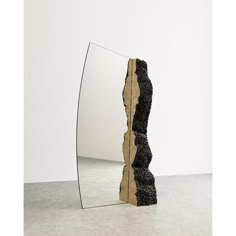 a mirror that is sitting on the ground