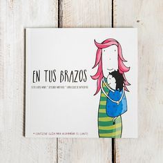 a card with an image of a woman holding a cat in her arms and the words en tus brazos on it