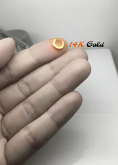 Teeny tiny 14K gold cartilage hoop earring for upper ear piercings. Sold as a single earring. This solid 14K yellow gold ear cartilage hoop earring is made in a brushed finish. Perfect for helix, tragus, Anti tragus, daith, or rook piercing. This earring is extremely small and may not fit everyone. Please check dimension carefully before placing an order. Product attributes Metal: high quality 14K solid gold Approximate inner diameter: 4mm Approximate outer diameter: 8mm Approximate width: 1.4mm 14k Gold Small Hoop Nose Rings, Internally Threaded, 14k Gold Small Hoop Nose Rings With Internal Thread, Tiny 14k Gold Nose Rings, 14k Gold Small Hoop Nose Rings, Tiny 14k Gold Round Nose Rings, Dainty 14k Gold Internally Threaded Nose Rings, Hypoallergenic 14k Gold Round Piercings, 14k Gold Hypoallergenic Small Hoop Nose Rings, Hypoallergenic Small Hoop Nose Rings In 14k Gold