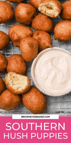 some fried hush puppies on a cooling rack with dip