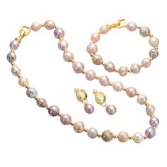 Bold multi-color baroque pearl jewelry set Elegant baroque pearl necklaces, bracelets, and earrings are all in one. Made with AAA freshwater baroque pearls, this multi-color baroque pearl jewelry set is a fine way to accessorize any outfit. Whether you’re searching for a statement real pearl set for a wedding or any occasion, or you’re looking for something unique to give to a friend on her birthday, this baroque pearl earrings necklace and bracelet set is a perfect match. Unique baroque pearl n Multicolor High Luster Round Beaded Jewelry, Multicolor High Luster Round Bead Jewelry, Elegant Baroque Pearl Jewelry With Polished Beads, Elegant Multicolor Jewelry With Pearl Charm, Multicolor Baroque Pearl Jewelry Gift, Elegant Multicolor Pearl Charm Jewelry, Gift Baroque Pearl Multicolor Jewelry, Wedding Pink Baroque Pearl Necklaces, Luxury Beaded Baroque Pearl Jewelry