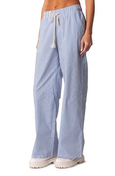 Vertical stripes and a rope-inspired braided drawstring lend nautical appeal to wide-leg pants cut from lightweight and breathable cotton. Elastic/drawstring waist Side-seam pockets 100% cotton Machine wash, line dry Imported Striped Linen Pants, Summer Lounge, Pant Trends, Women Y2k, Pinstripe Pants, Printed Wide Leg Pants, Summer Pants, Pants Casual, Casual Streetwear