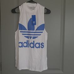 Adidas Originals Tee Condition: New Color: White/ Blue Size: S/ M One Per Order No Holds/ Trades Blue Tank Top For Spring Streetwear, Spring Blue Tank Top For Streetwear, Adidas Cotton Tank Top For Spring, Adidas Blue Sleeveless Top, Adidas Casual Summer Tank Top, Adidas Casual Sleeveless Top, Casual Adidas Summer Tank Top, Casual Adidas Sleeveless Top, Adidas Casual Cotton Tank Top