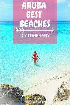 a woman wading in the ocean with text overlay that reads aruba best beaches diy itinerary