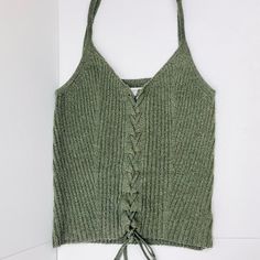 Hi Everyone! This Is A Lace Up Knit Crop Tank Top In Forest/Olive Green Purchased From American Eagle Outfittters. Brand: American Eagle Outfitters Condition: Perfect, No Flaws, Either Worn Once Or Never Worn Before Color: Forest/Olive Green Size: Us Xs, Fits Like An Xs/S Soft Knit Fabric Adjustable Lace Up Strings In Front Olive Knit Tops For Fall, Casual Olive Knit Tops, Knitted Crop Tank Top, Crop Tank Top, Knit Crop, Cropped Tank Top, Crop Tank, Soft Knits, Olive Green