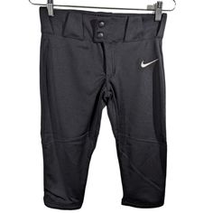 the nike leggings are black and have silver buttons on each side, along with an attached hanger