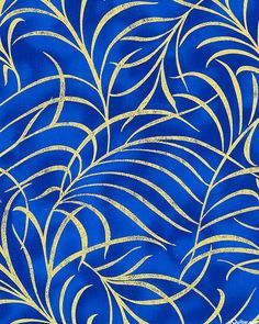 a blue background with gold leaves on it