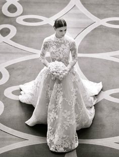 black and white photo of a woman in a wedding dress