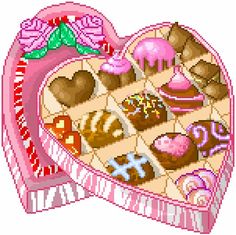 a heart shaped box filled with lots of treats